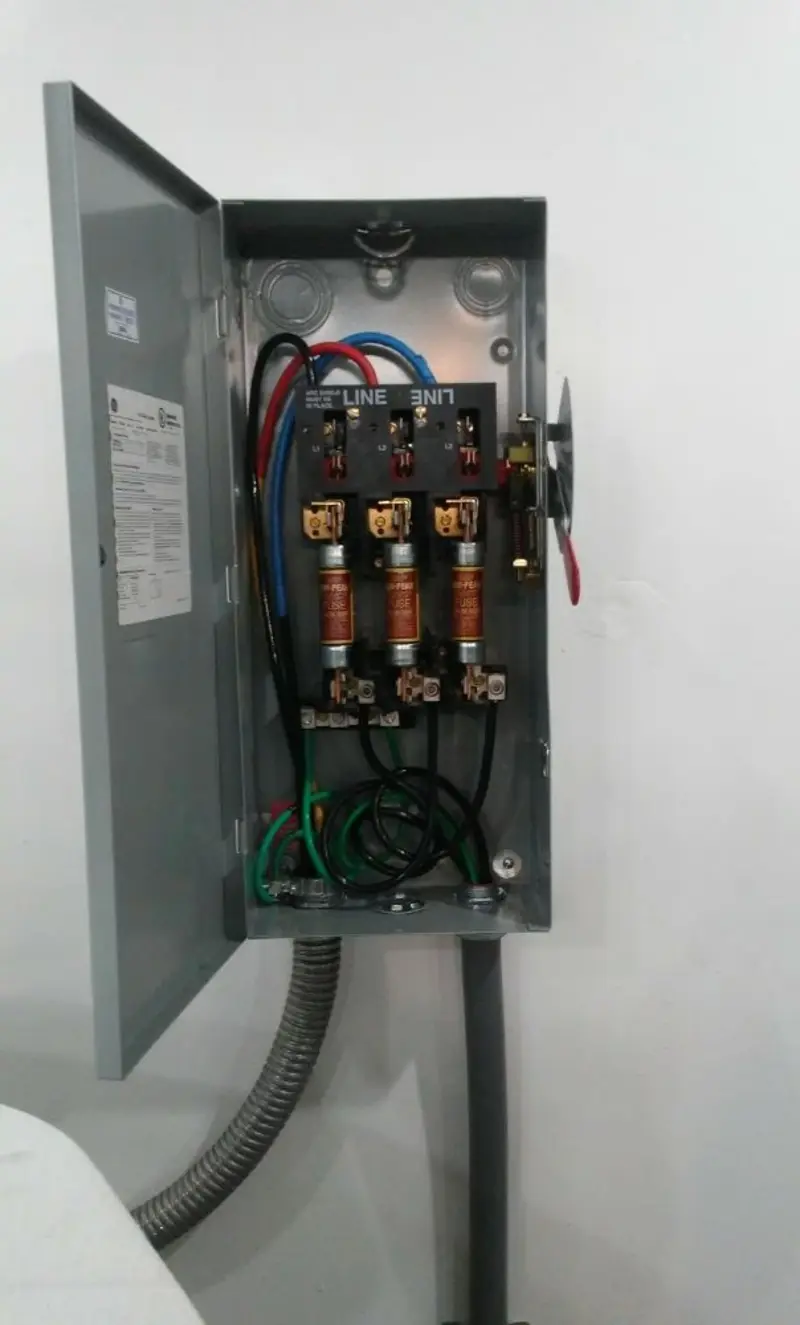 Three-phase disconnect switch installed for Smoke Detector Installation in Adams